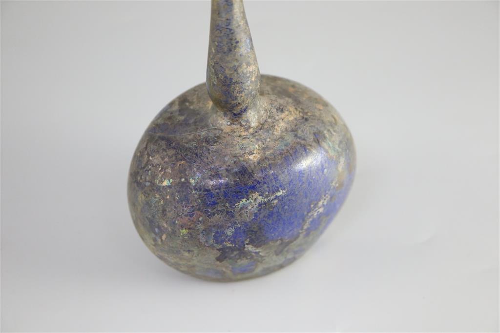 An Islamic blue glass perfume sprinkler, Egypt, c.1250-1350 AD, 17cm high,